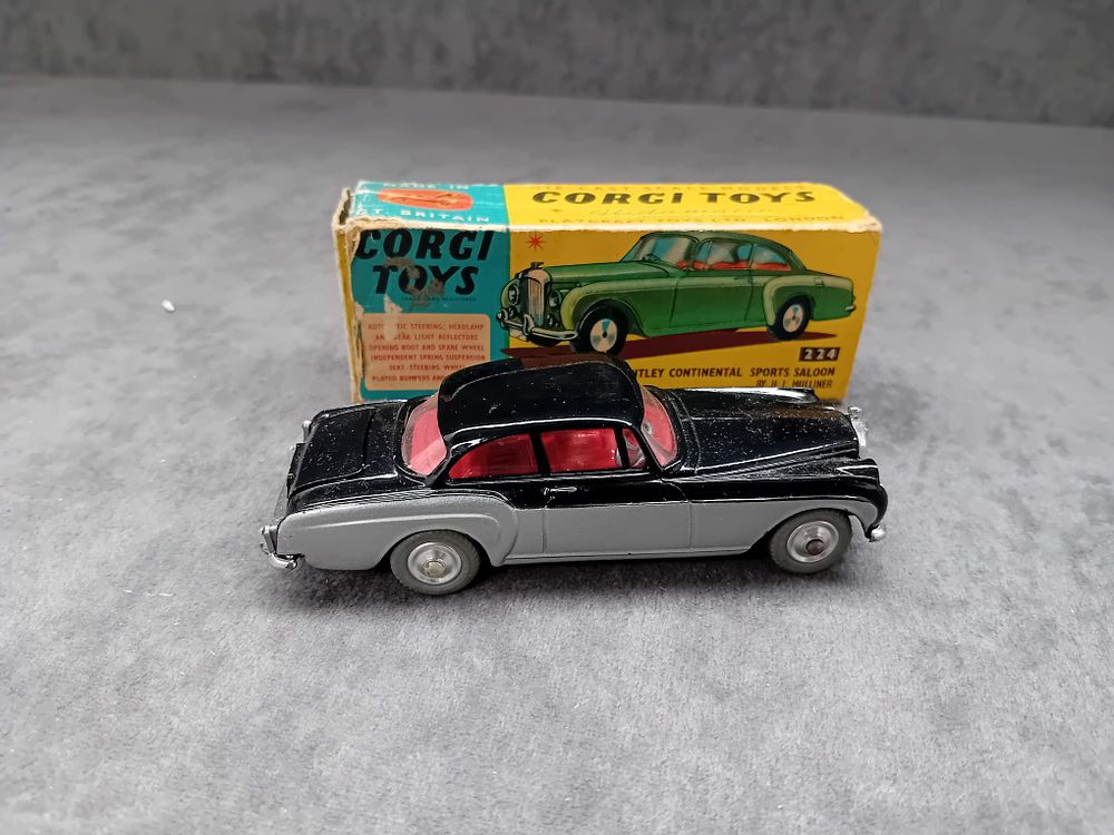 Lot 256: Corgi Toys #224 Bentley Continental Sports Saloon in Black & Grey With Spare Wheel in Boot & Red Interior.