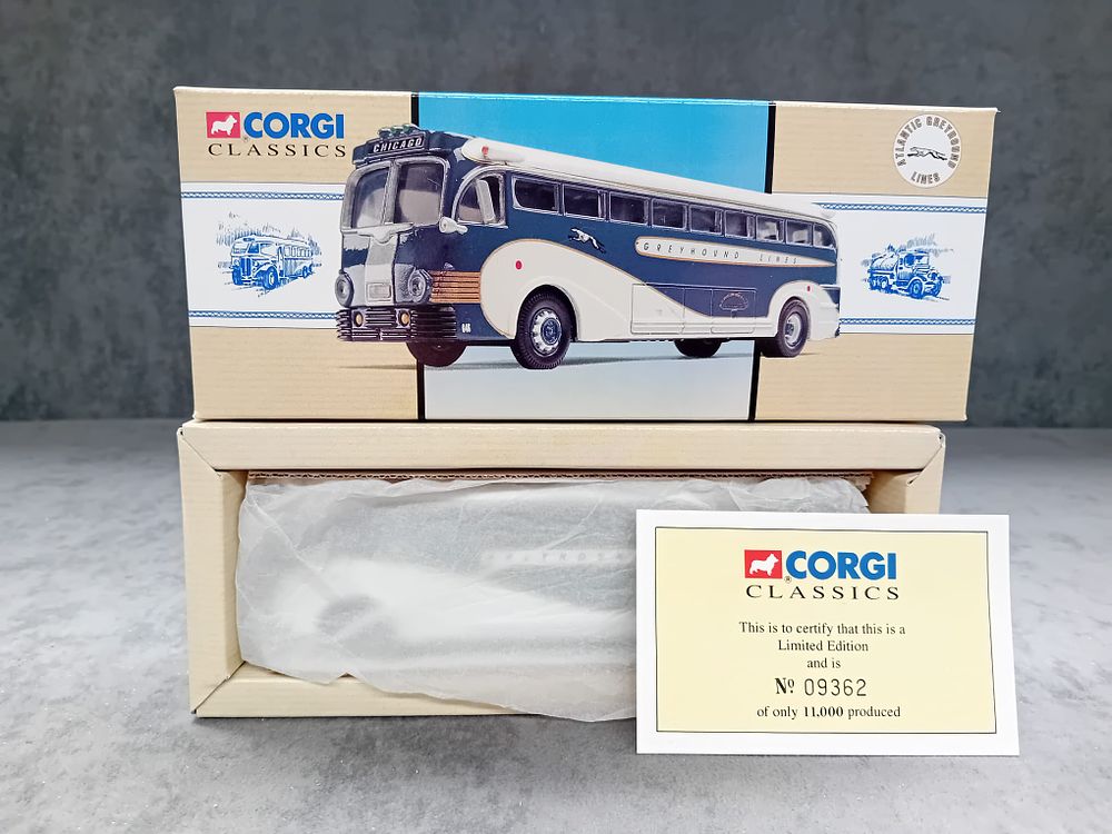 Lot 255: Pair of Corgi Classics Vintage Busses USA #98462 Yellow Coach 743 Greyhound Lines and #98600 General Motors 4502 Greyhound Lines.