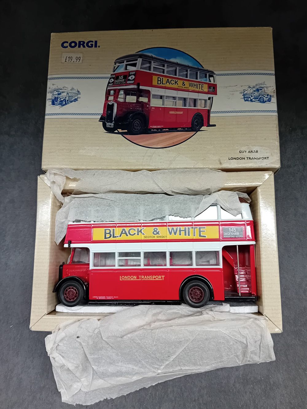 Lot 251: Three Corgi Classic Commercials #97170 Birlinghams Seagull Woods #97171 Birlinghams Seagull Neath & Cardiff #97203 Guy Arab London Transport.