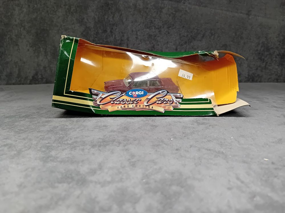 Lot 240: Mixed lot of Corgi Classics Collectors Series #D702/4 Morris Minor #C702/2 Morris Minor #D710 Ford Zephyr #C703/1 Morris Minor #D709/1 Ford Zodiac and one other.