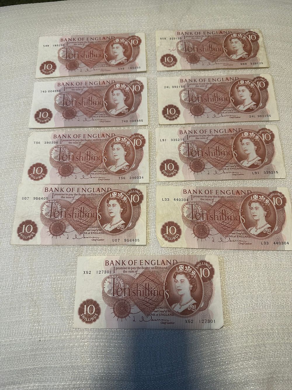 Lot 271: 9 x 10 shilling notes J.Hollom Chief Cashier.