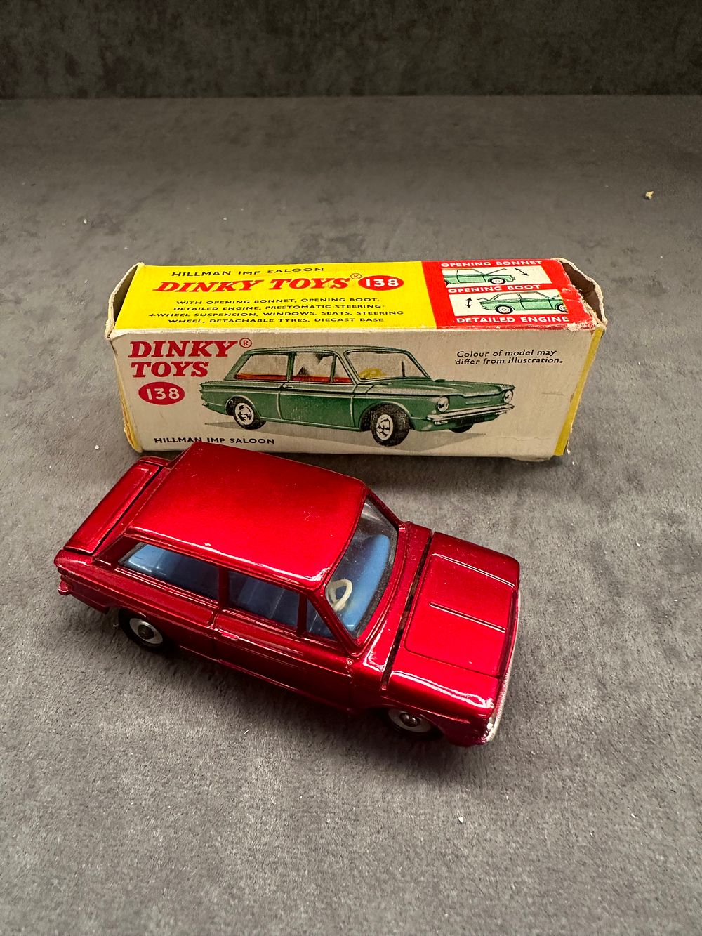 Lot 192: Vintage Original Dinky 138, Hillman Imp Saloon in red with blue interior, Boxed Some slight box crushing as pictured
