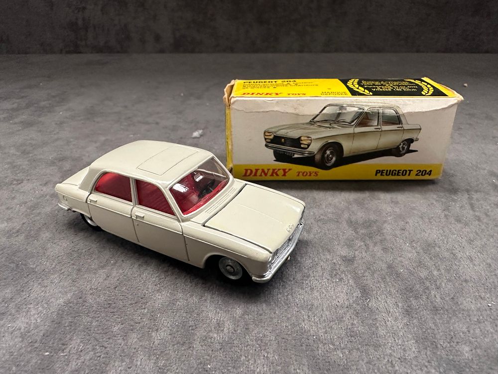 Lot 189: Dinky Toys 510 Peugeot 204 made in Spain 1/43 scale NM box with slight crushing.
