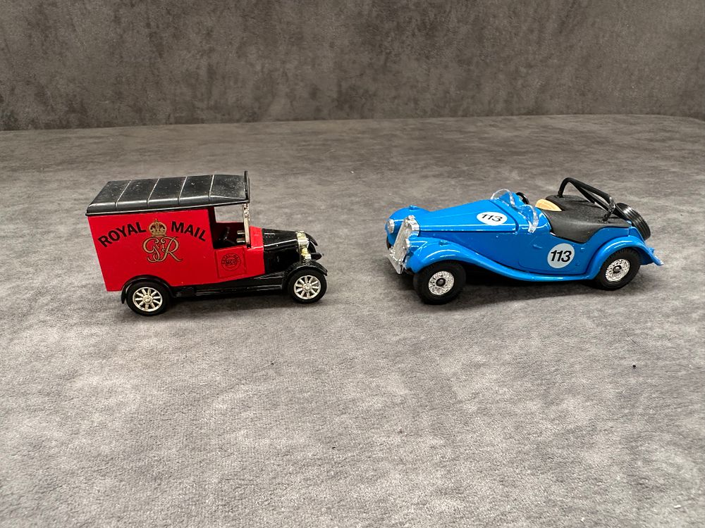 Lot 515: 2 x Corgi (No Reserve) Roymail and one other as pictured by