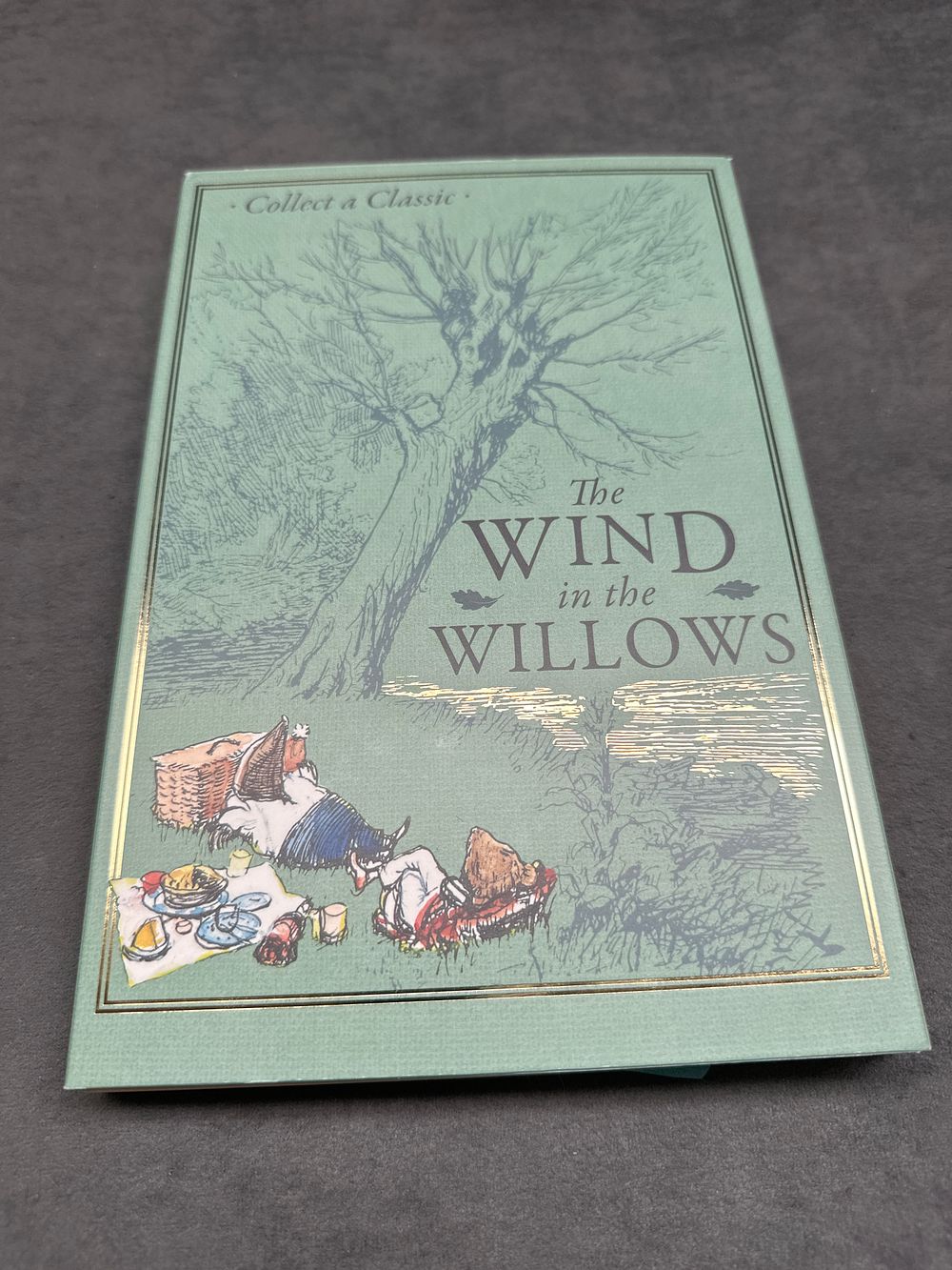 Lot 263: The Bradford exchange wind in the Willows coin set with one coin only please see pictures