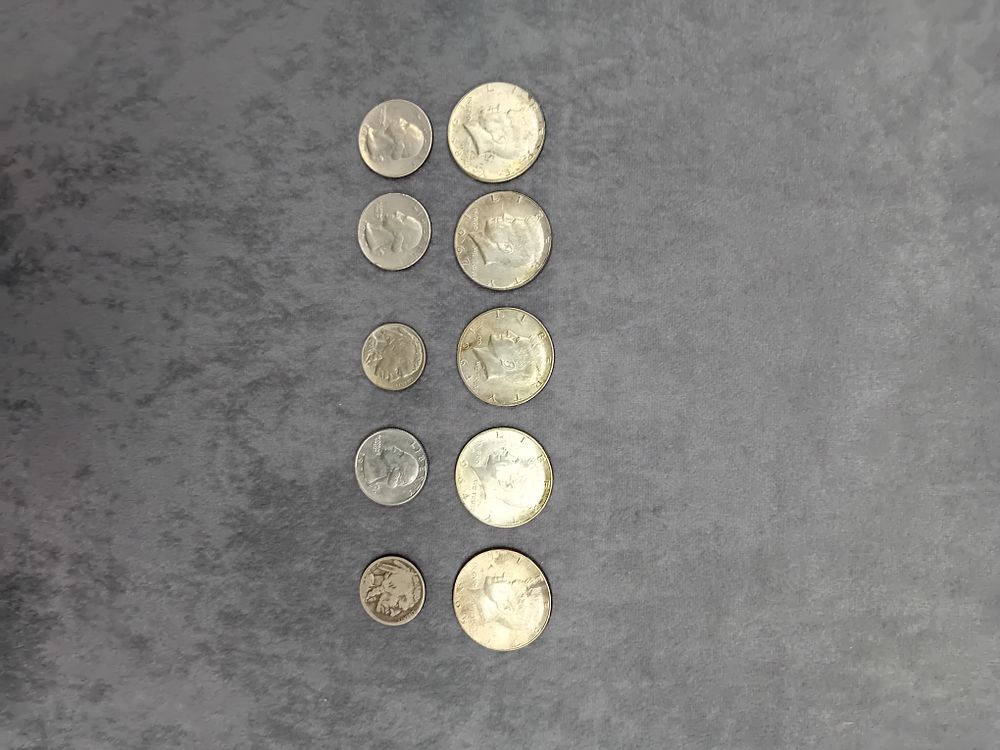 Lot 258: Mixed Lot of American coins as Pictured. includes half dollar, quarter and 5 cents.