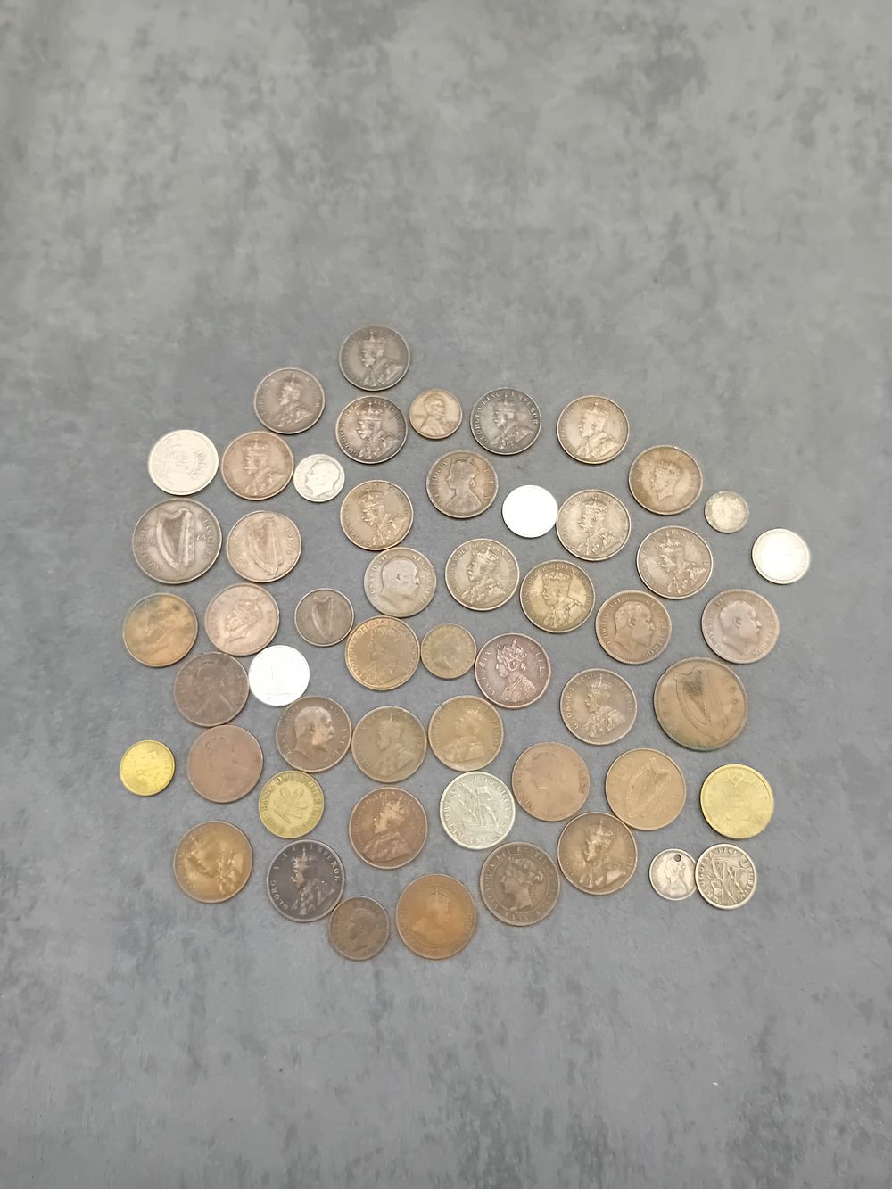 Lot 250: Huge Mixed Lot of global Coins. including British Empire Canada, India and lots more. please see images.
