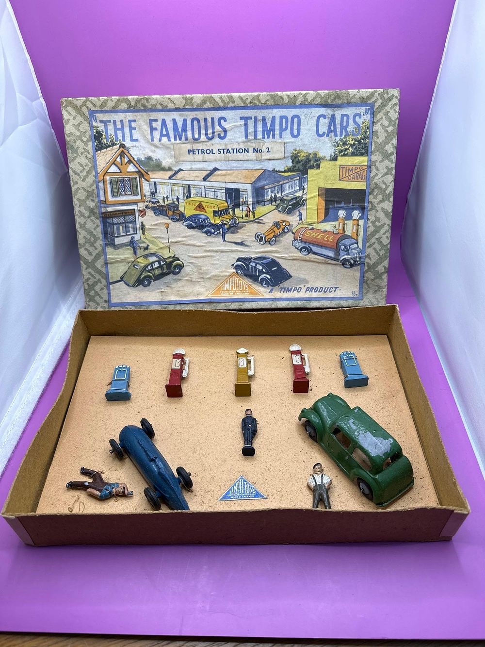 Lot 408: Timpo Toys Petrol Station number 2. Models have...