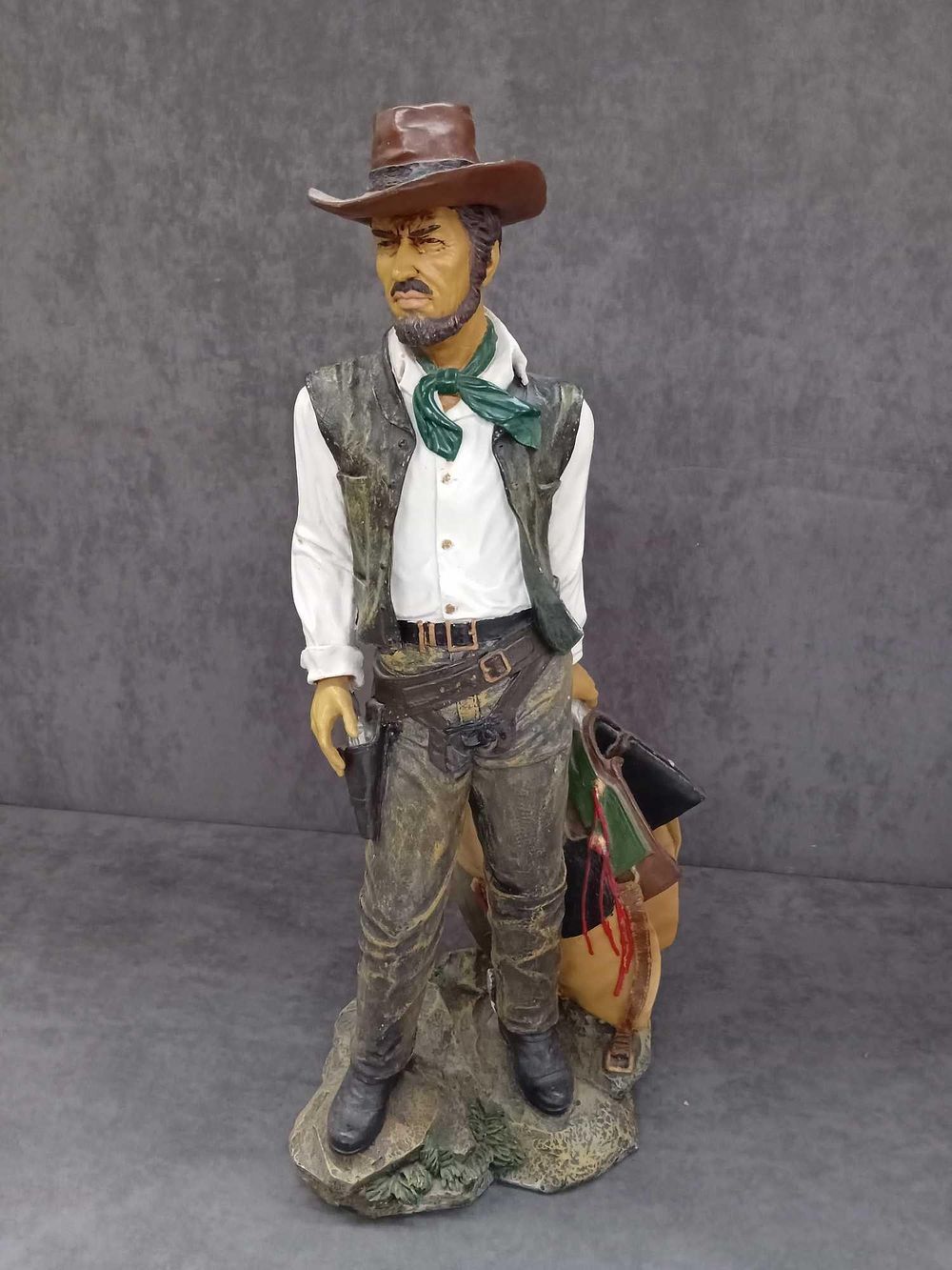 Lot 70: The Leonardo Collection Cowboy with saddle and holsters...
