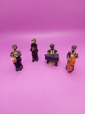 Vintage four piece jazz band musician figures