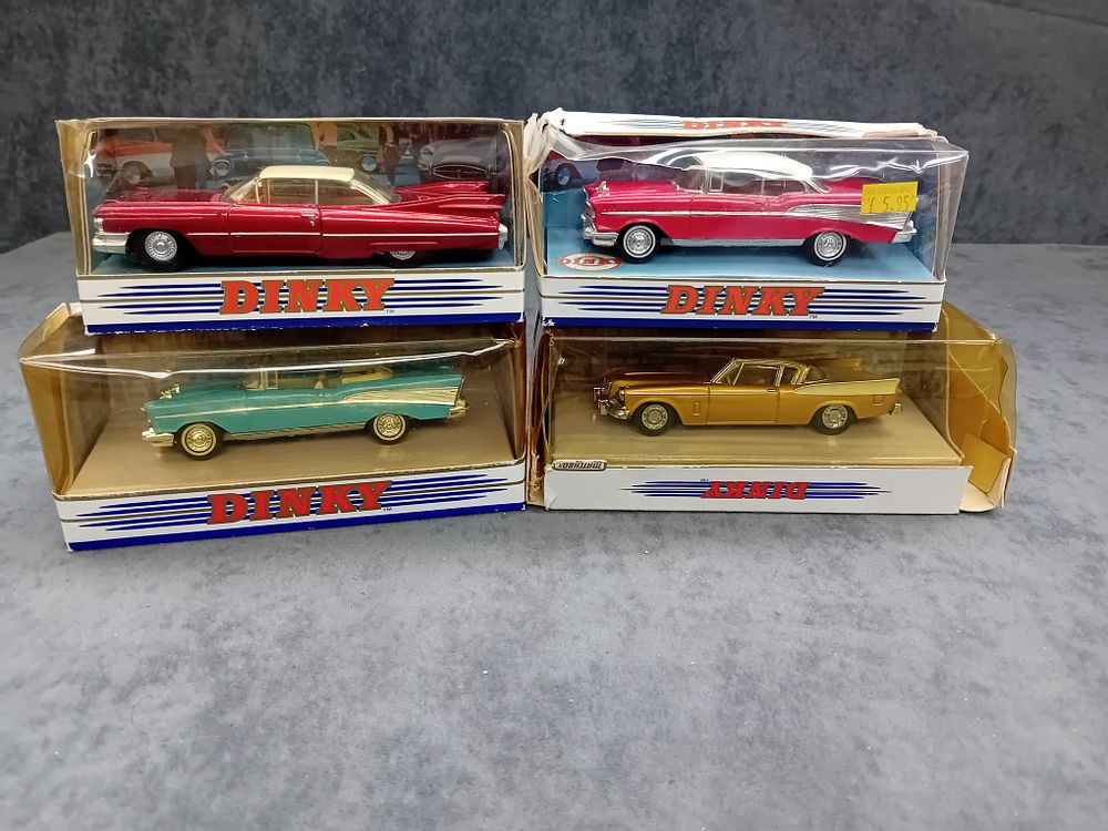 Lot 311: Mixed Lot of Dinky Matchbox Diecasts. #DY-27 1957 Chevy Convertible. #DY-27 1957 Chevy Bel Air. #DY-26 Studebaker Golden Hawk. #DY-7 1959 Cadillac Coupe De Ville.
