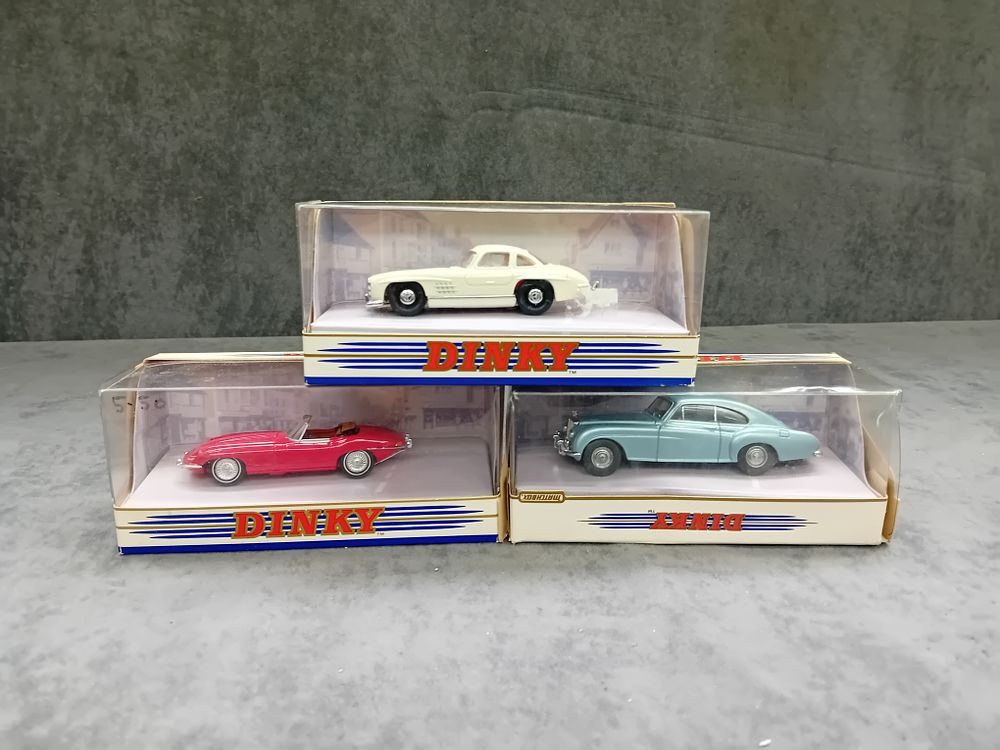 Lot 313: Mixed Lot of Dinky Matchbox Diecasts. #DY-13 Bentley Continental. #DY-12 1955 Mercedes Benz 300SL Gullwing. #DY-18 1968 Jaguar E Type MK1
