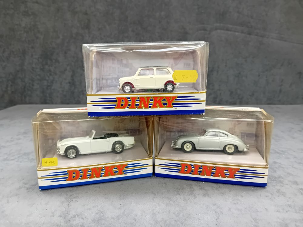 Lot 315: Mixed Lot of Dinky Matchbox Diecasts. #DY-28 1965 Triumph TR4A - IRS. #DY-21 1964 Mini Cooper S. #DY25 1958 Porsche 356a Coupe.