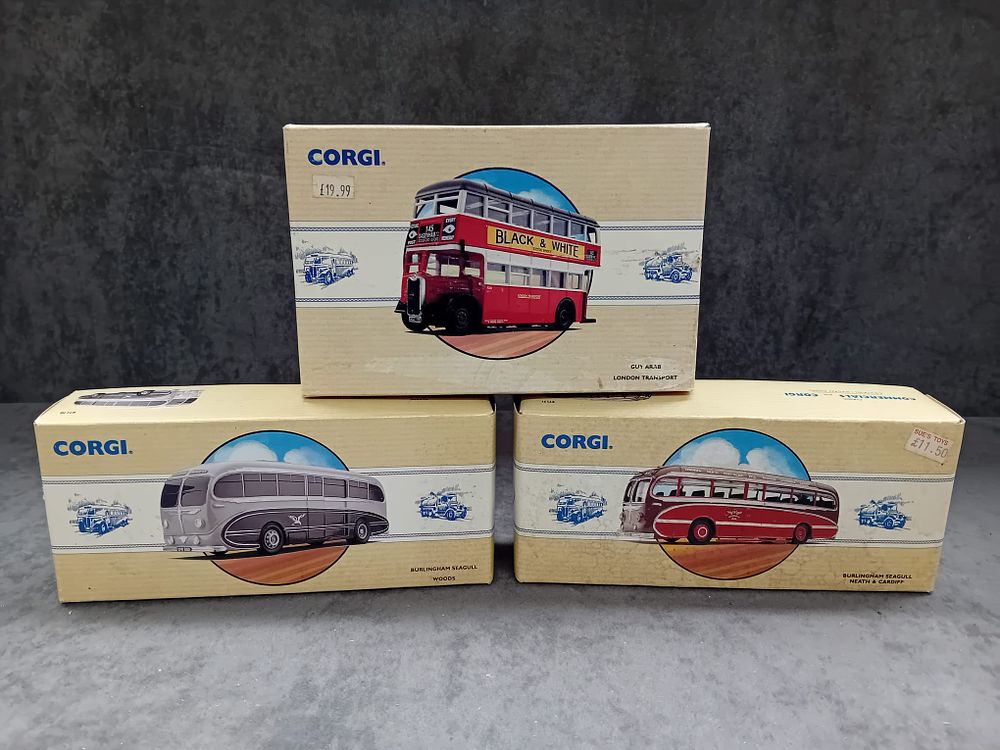 Lot 258: Three Corgi Classic Commercials #97170 Birlinghams Seagull Woods #97171 Birlinghams Seagull Neath & Cardiff #97203 Guy Arab London Transport.