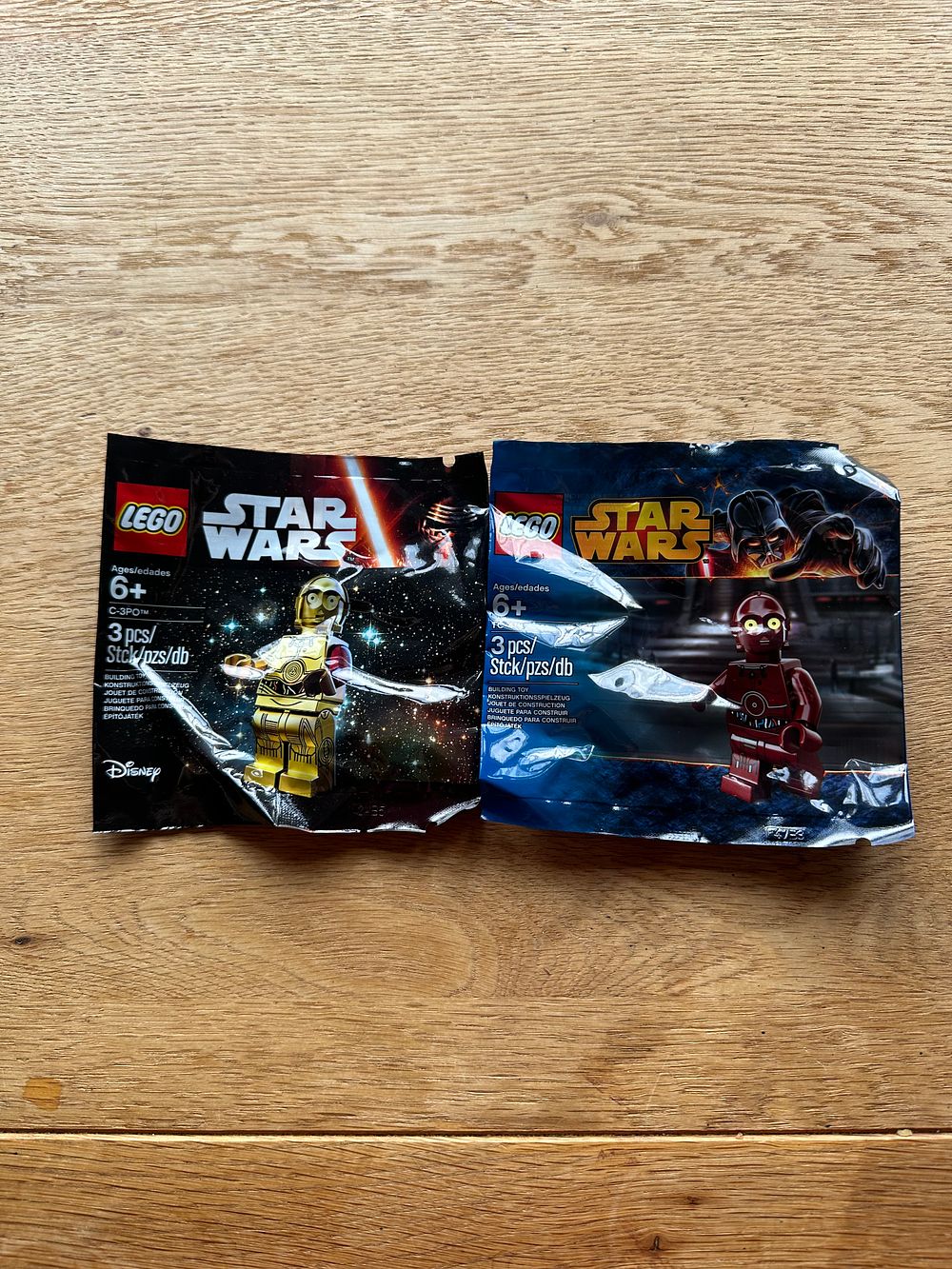 Lot 204: A pair of Lego Polly bag, Star Wars C-3PO and TC4 New and sealed bags