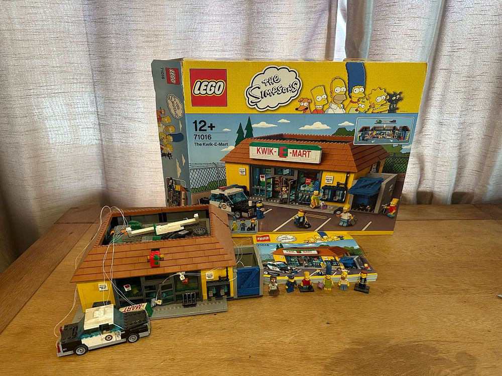 Lot 156: Lego 71016 The Simpsons Kwik-E-Mart Built set with box and manual