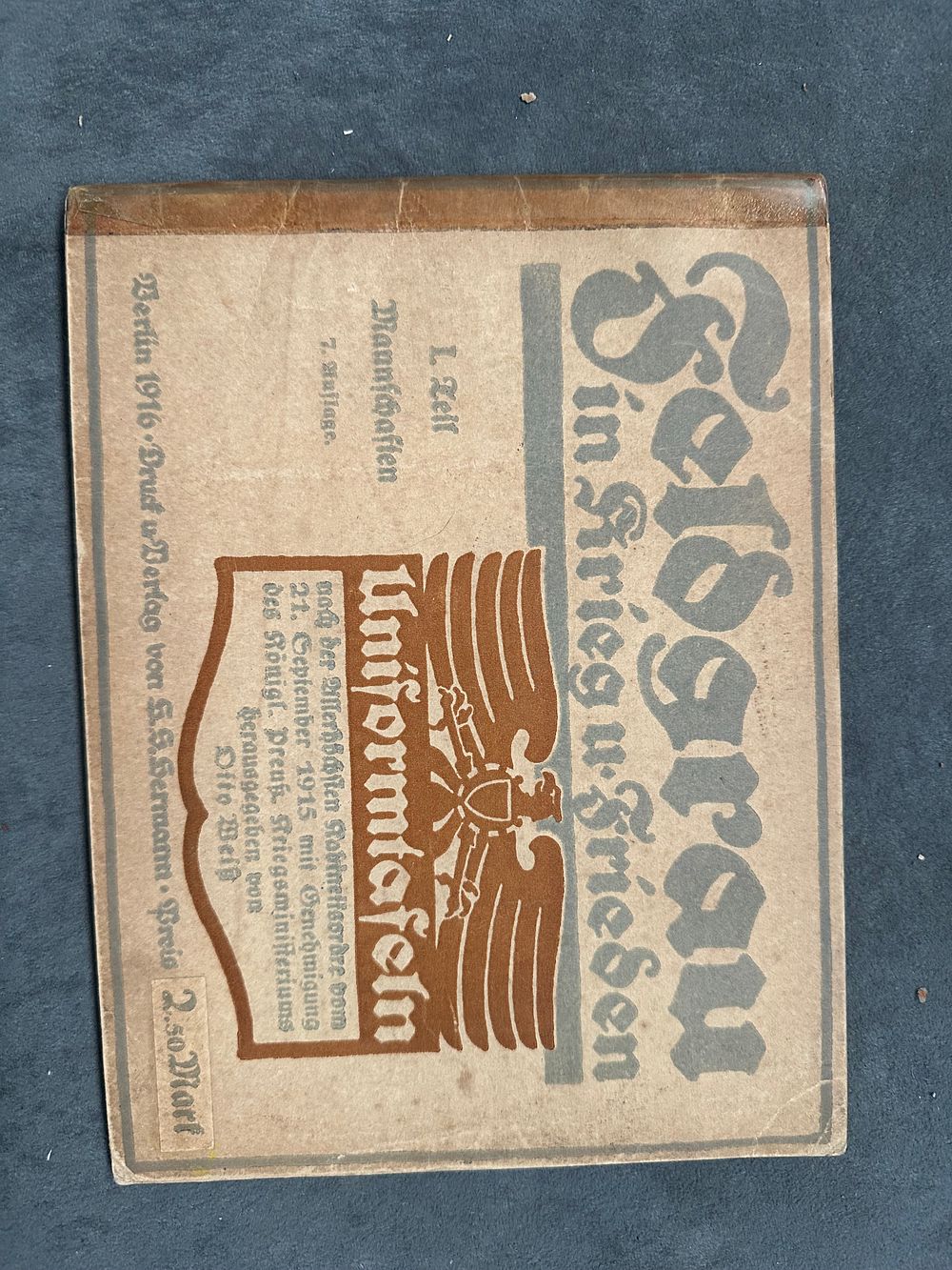 Lot 520: German 1916 issue booklet on uniforms and badges...