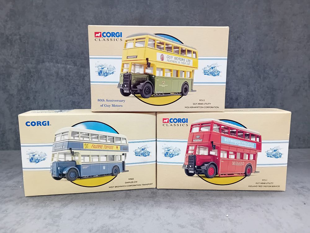 Lot 297: Three Corgi Classics Public Transport #97311 Guy Arab Utility Midland Red Motor Services #97820 Daimler CW West Bromwich #97312 Guy Arab Utility Wolverhampton Corporation.