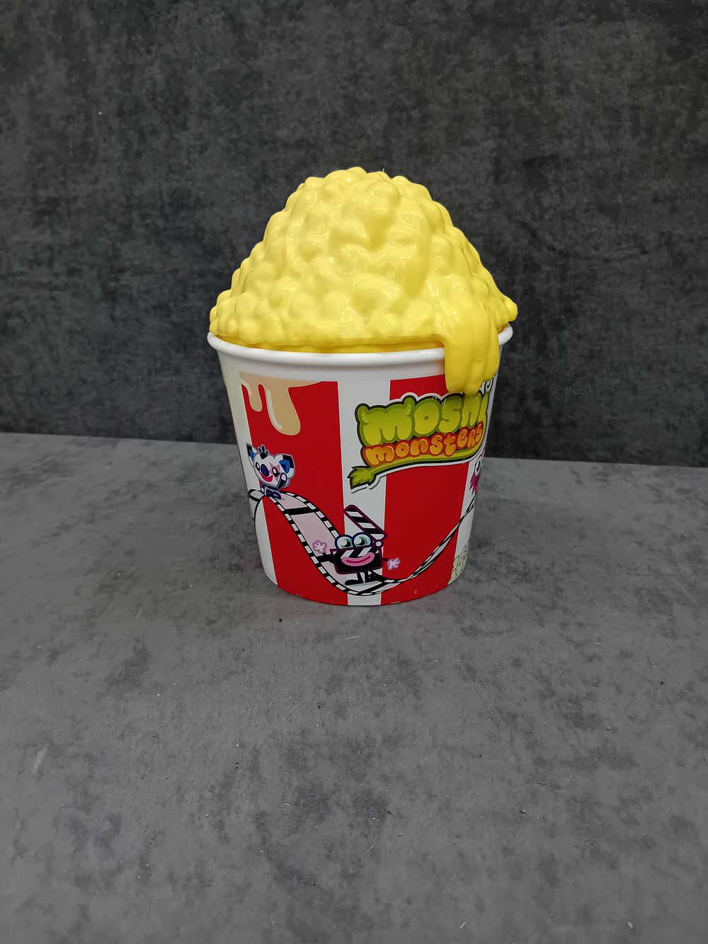 Lot 452: NO RESERVE Moshi monsters popcorn bucket and 37...