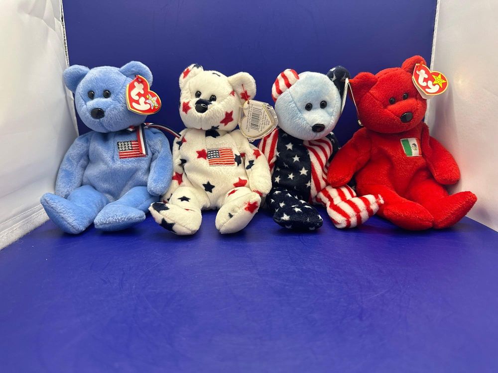 Lot 195: 4 x TY Beanie Bears all with tags....