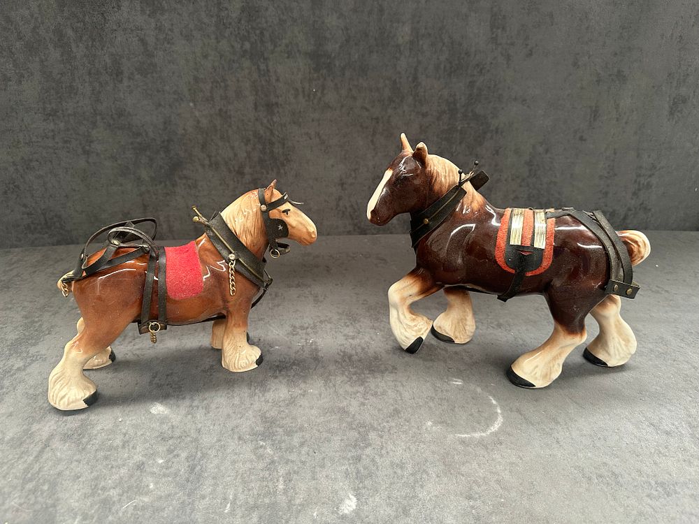 Lot 1046: A pair of ceramic Shire horses lovely models