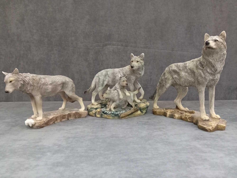 Lot 1079: Collection a 3 wolf ornaments as pictured