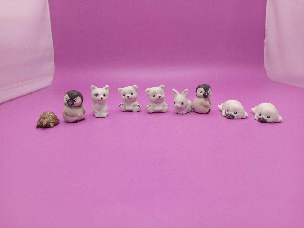Lot 854: Set of 9 miniatures as pictured