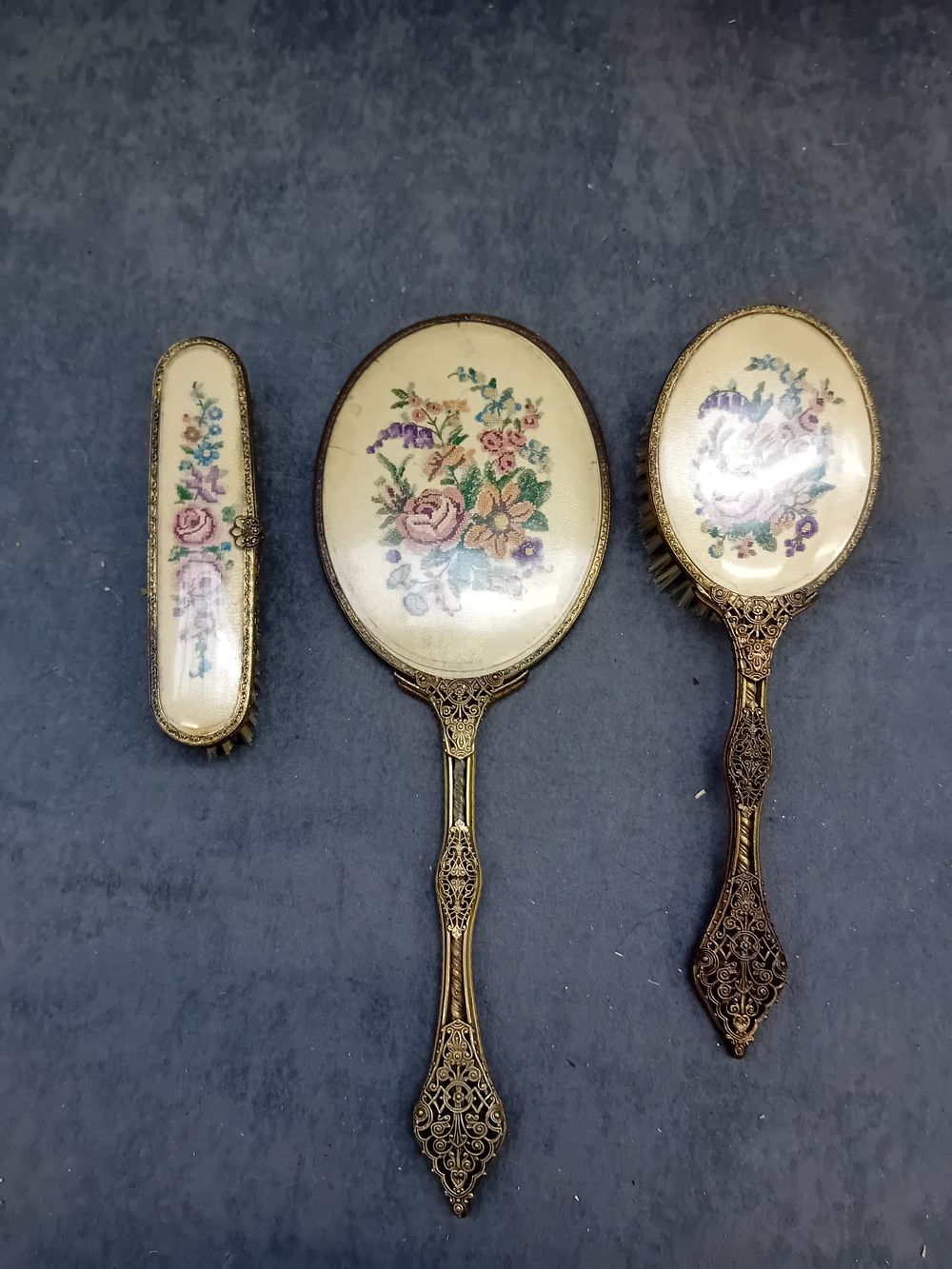 Lot 775: Vintage Ornate Vanity Set – Hand Mirror, Brush,...