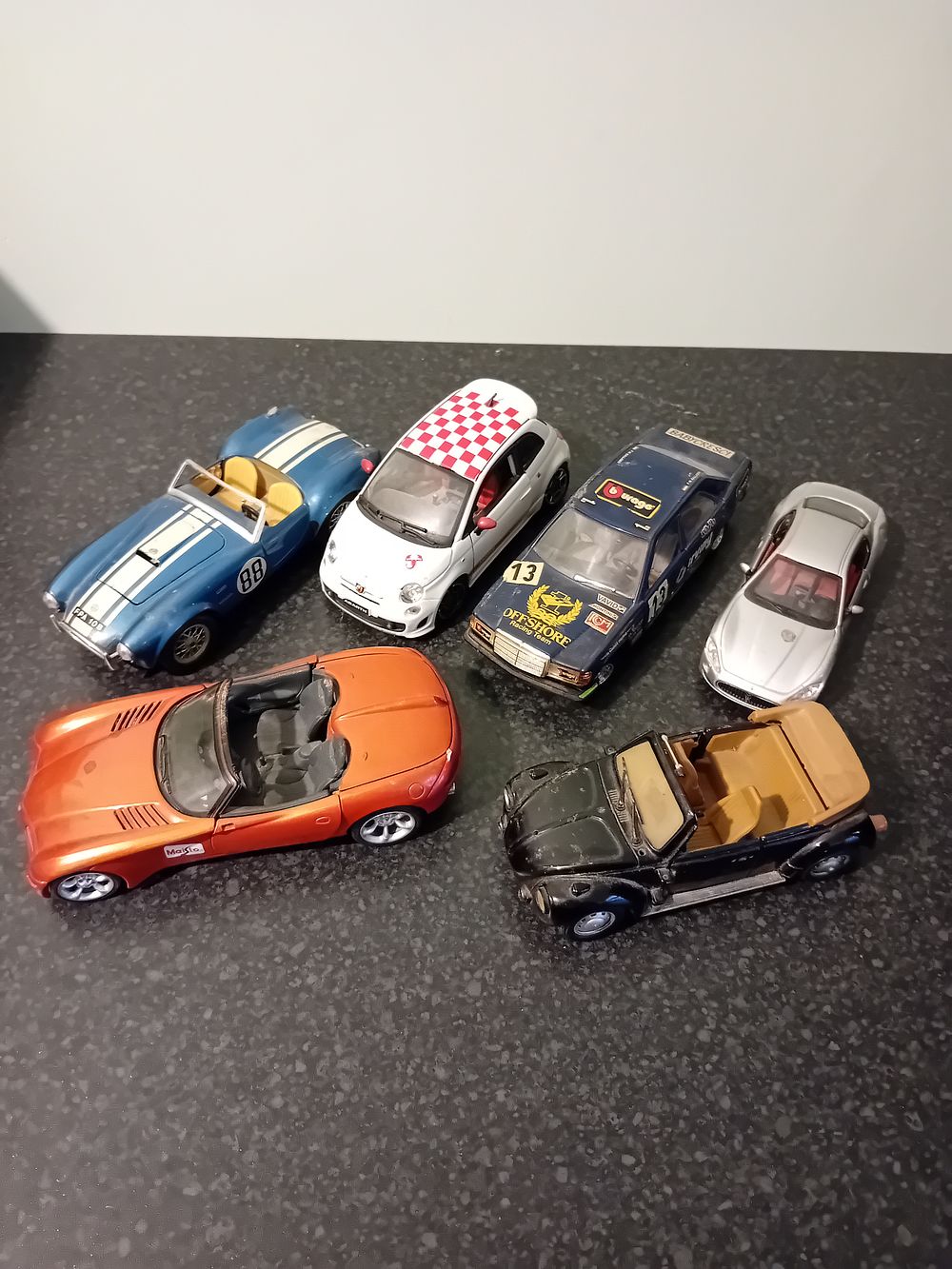 Lot 481: Lot of 6 heavily played with diecast cars...