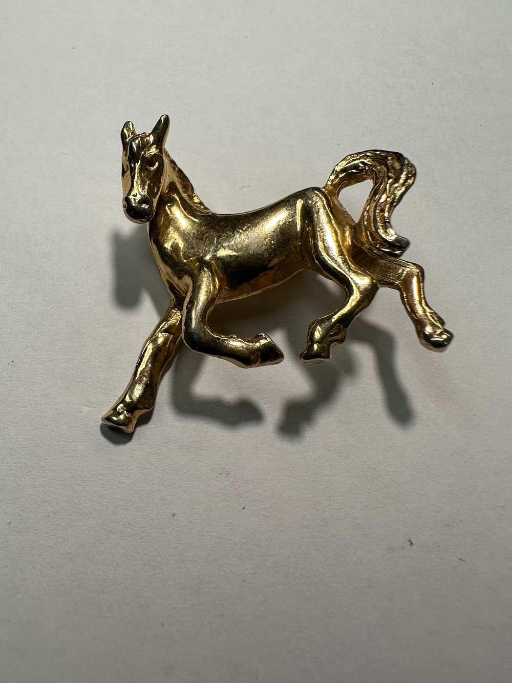 Lot 532: Galloping Horse Brooch 