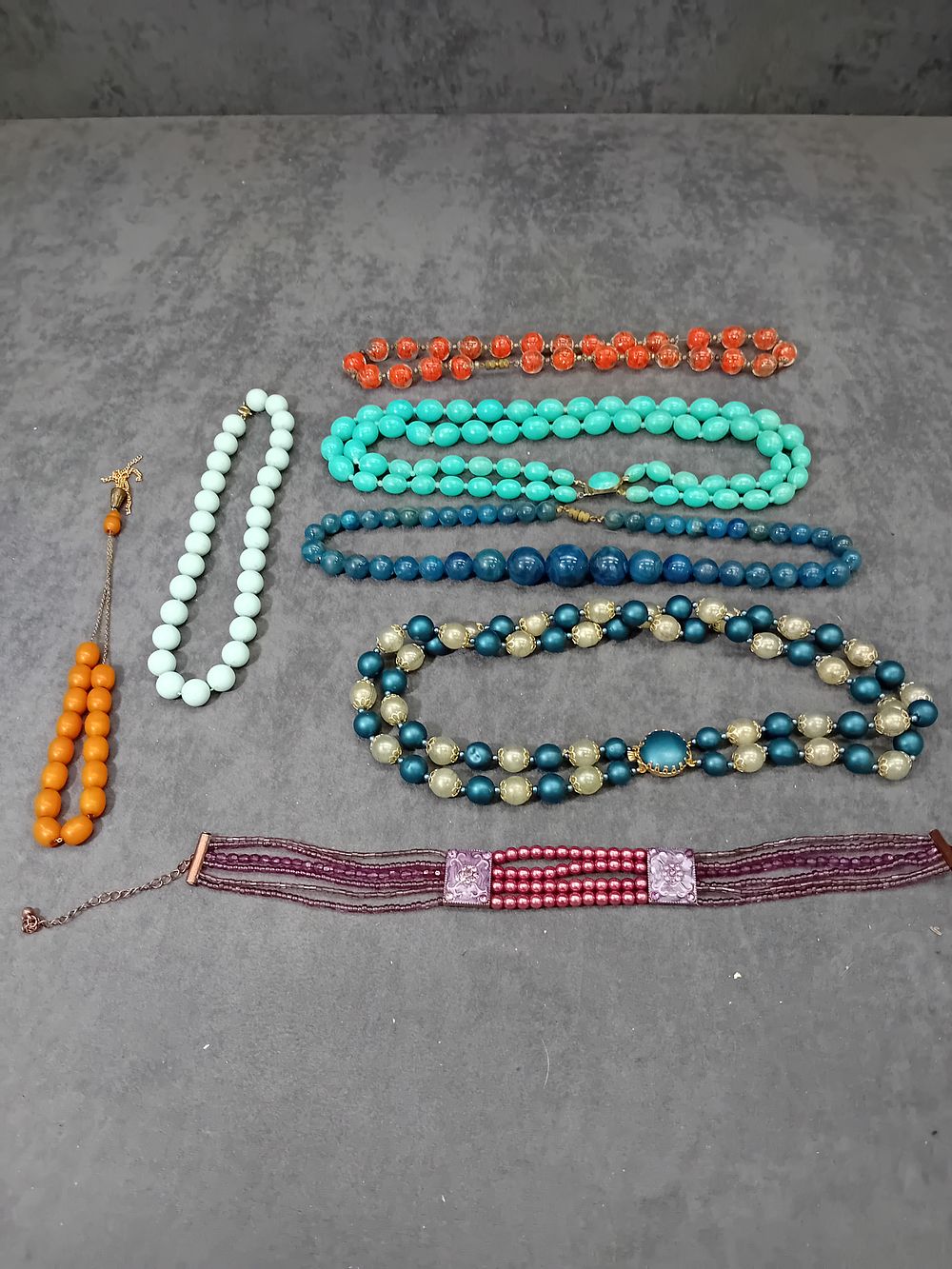 Lot 567: Mixed lot of of coloured beaded necklaces as...