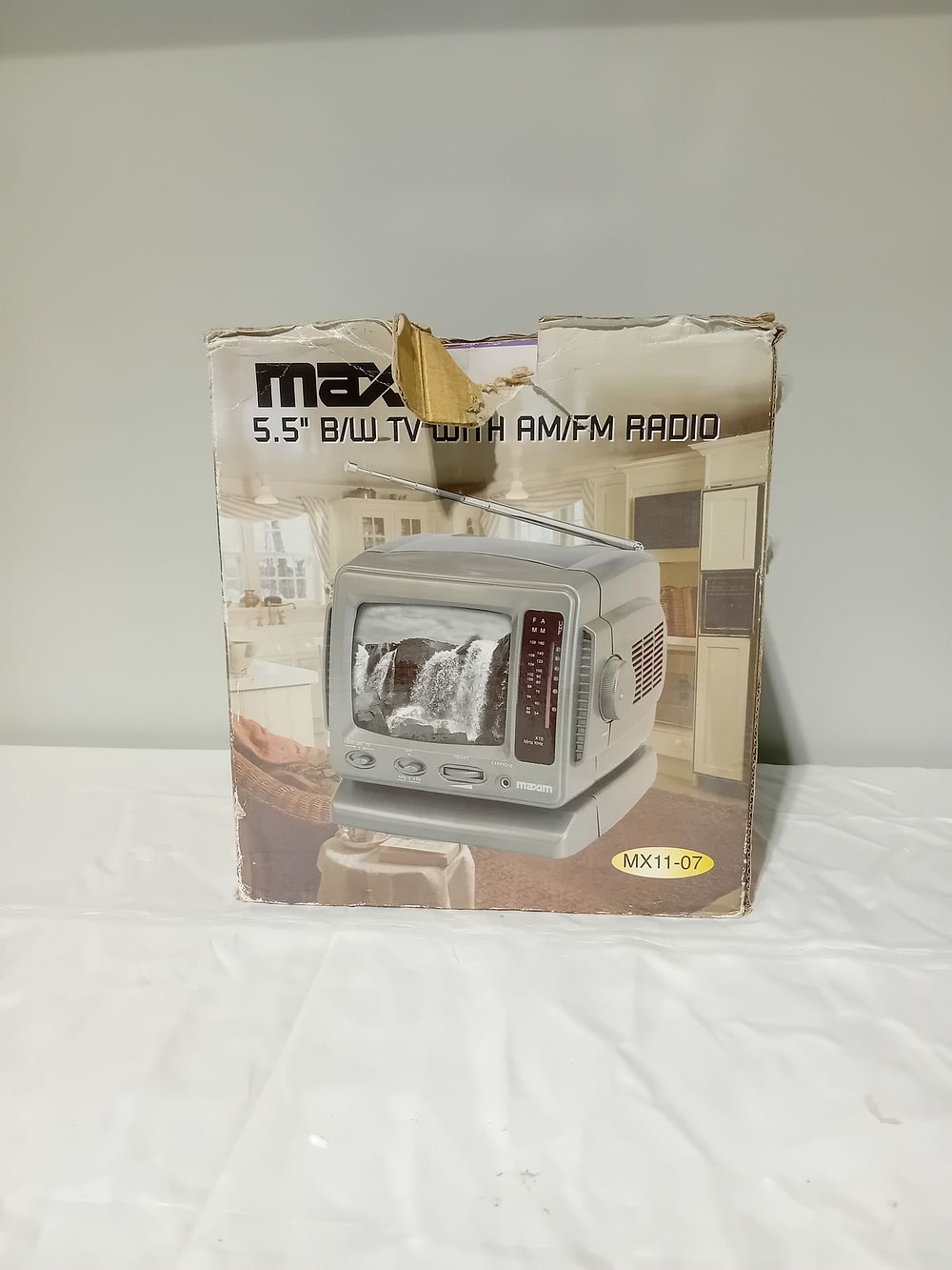 Lot 1123: Maxim 5.5 inch B/W TV with AM/FM Radio...