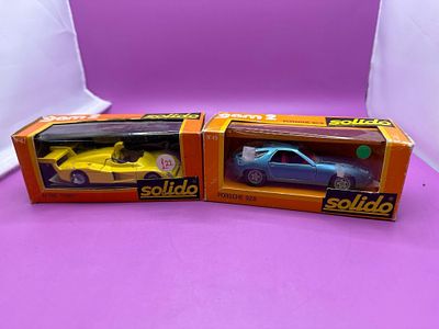 2 x Solido Models gam 2. Alpine turbo in yellow and Porsche 9 to 8 in peel blue with red interior