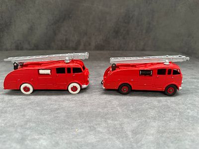 A pair of dinky repainted fire engines dinky 955 and dinky 555