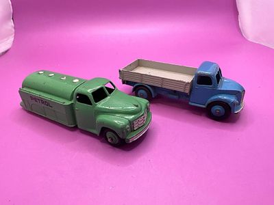 2 Dinky Toys Unboxed Petrol Truck In Green And Dodge Tipper Lorry 414 In Blue And Grey.