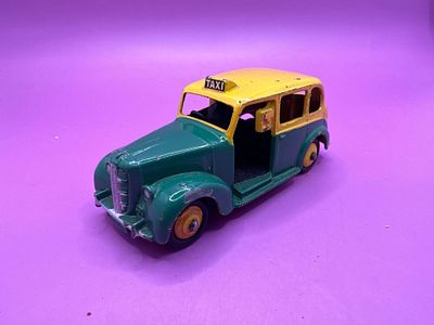 Dinky Toys Unboxed Austin Taxi In Green And Yellow.