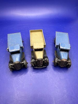 3 x Dinky flat Bed Trucks as pictured. Unboxed.
