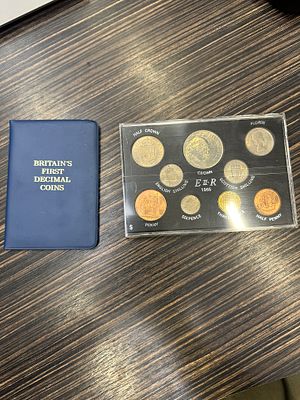 2 x British coin sets one first Decimal and one from 1965 in case