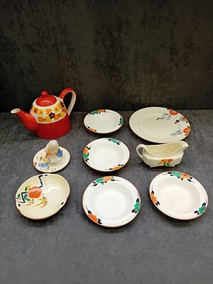 Mixed Lot of Vintage Floral Ceramic Tableware Including Teapot and Serving Pieces 
This is a 