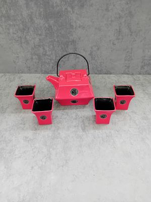 Red square oriental tea pot and cups as pictured