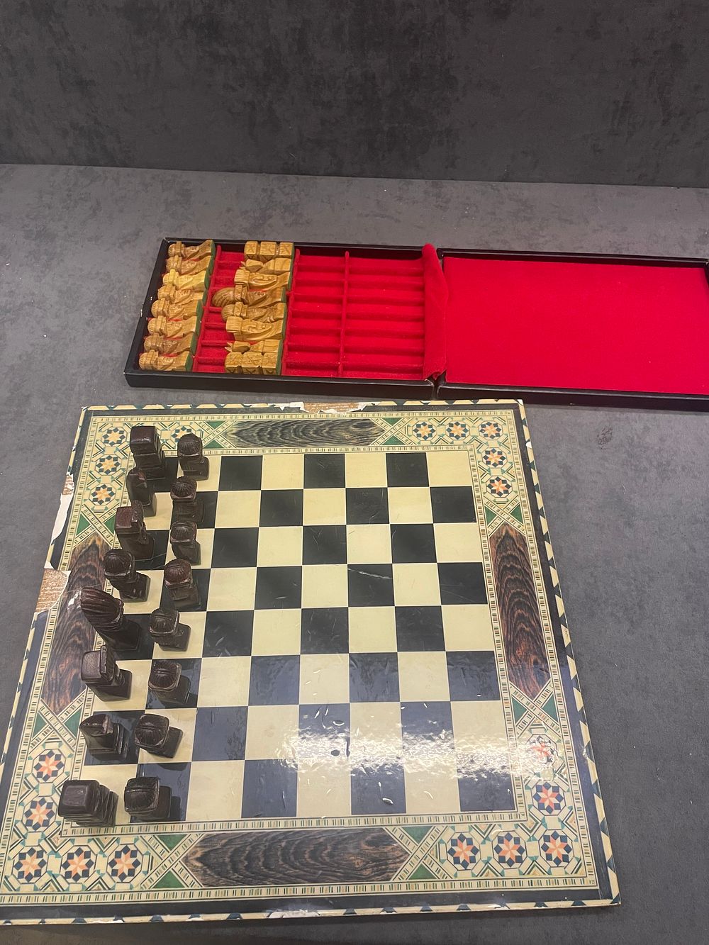 Lot 341: Hand carved chess set with box and bound...