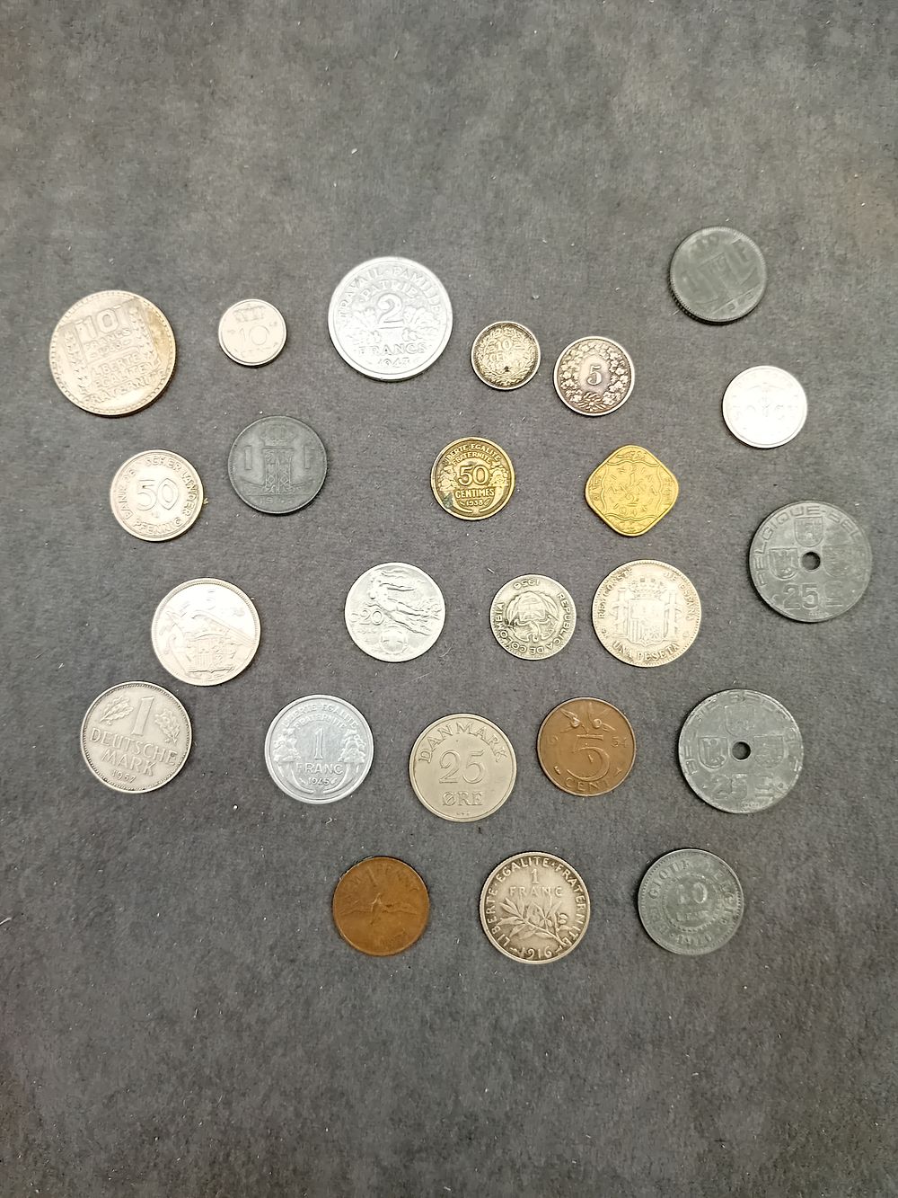 Lot 215: Mixed lot of European and International coins as...