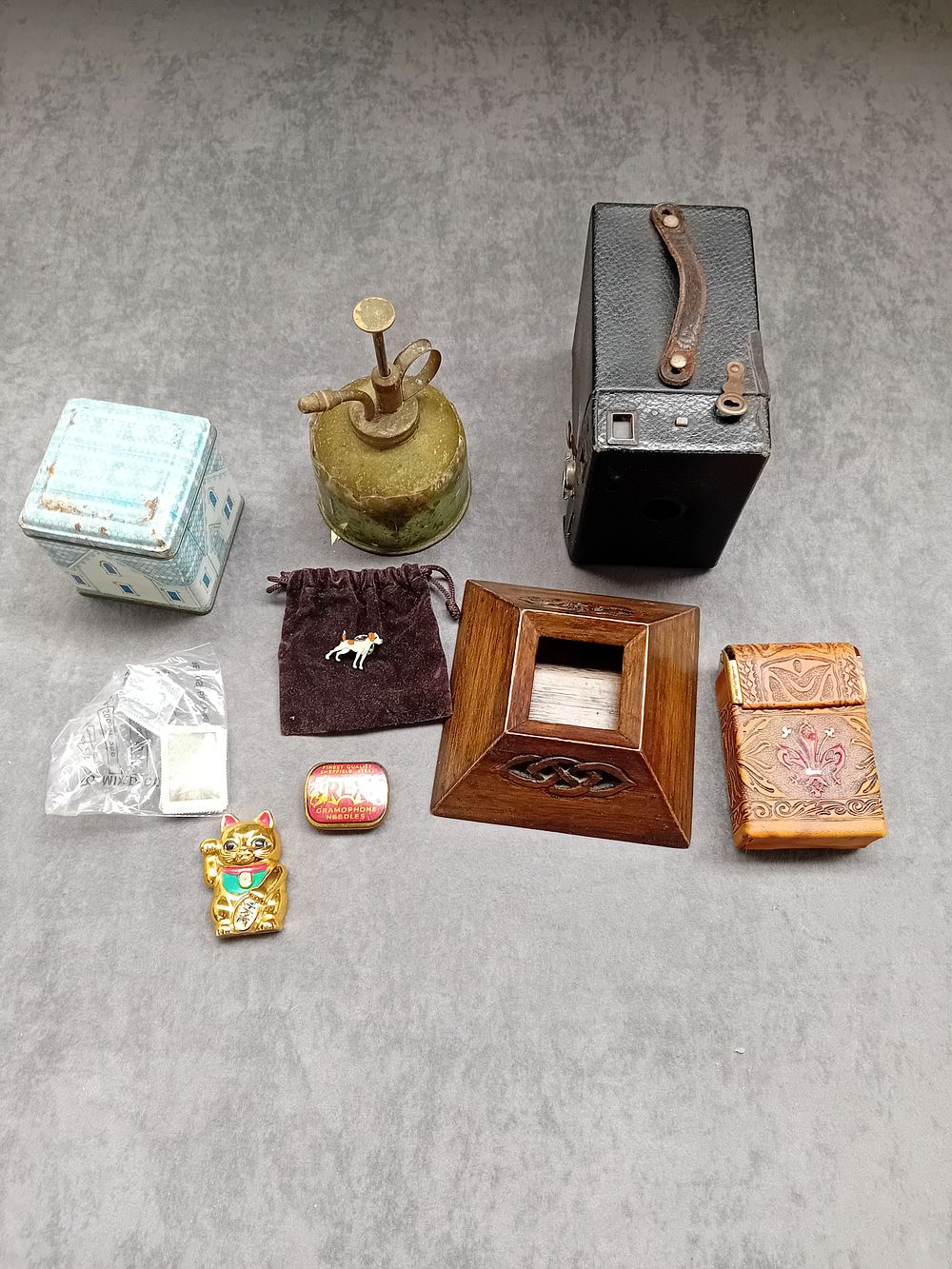 Lot 1059: Mixed Lot of Vintage Items including Box Camera, Card Case, Record Player Pins, Tins and oil Can.