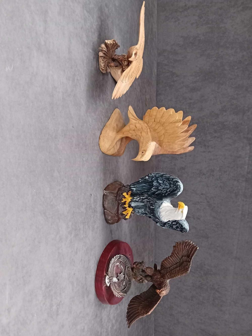 Lot 1103: Mixed lot of four eagles two wooden and...