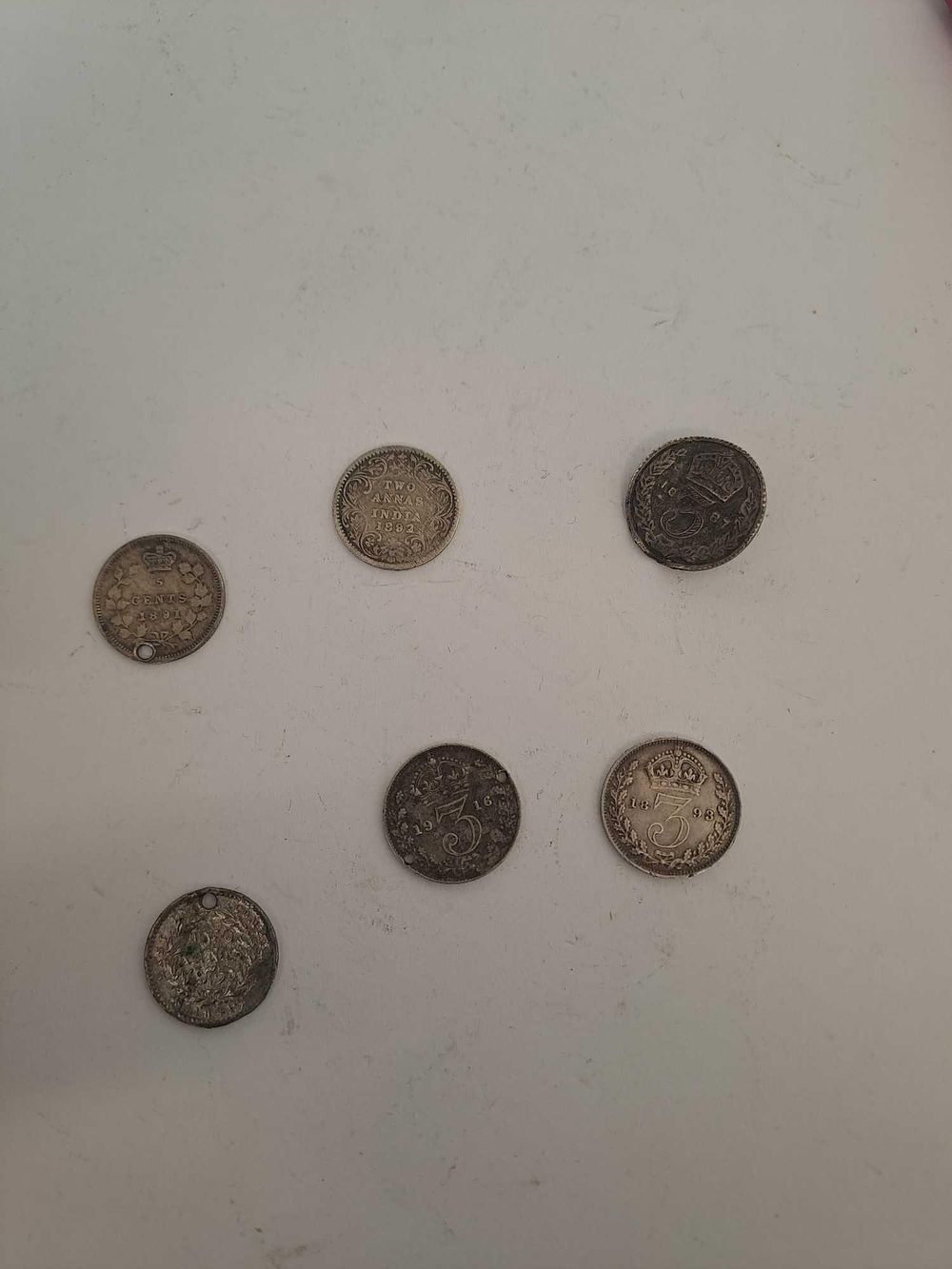 Lot 278: 5 coins from around the world with various...