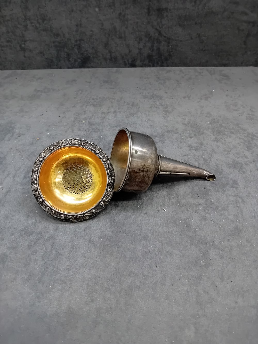 Lot 103A: Silver Plated Wine Funnel with a gilt styled...