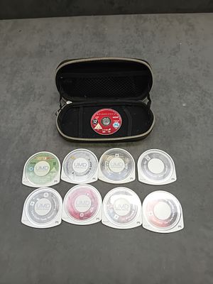 Mixed lot of PSP games in a PSP case as pictured there are a total of 9 PSP UMD discs in this lot