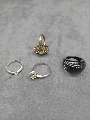 Mixed lot of dress rings as pictured there are a total of 4 rings in this lot