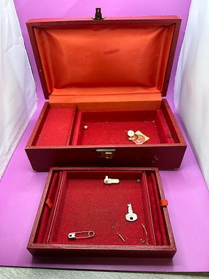 Wooden Jewellery box wrapped in a red styled leather. 29 x 16 x 10cm