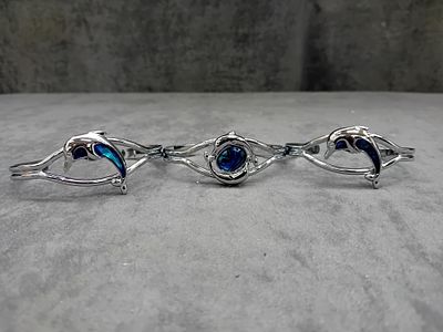 Mixed lot of Womans Dolphin bracelets as pictured
